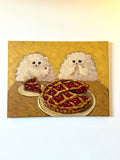 A square canvas painting depicting two fluffy white dogs sitting behind a cherry pie and a slice of pie on plates, set against a textured gold background.