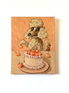 Celebration dog and cake acrylic painting displayed on a clean light wall