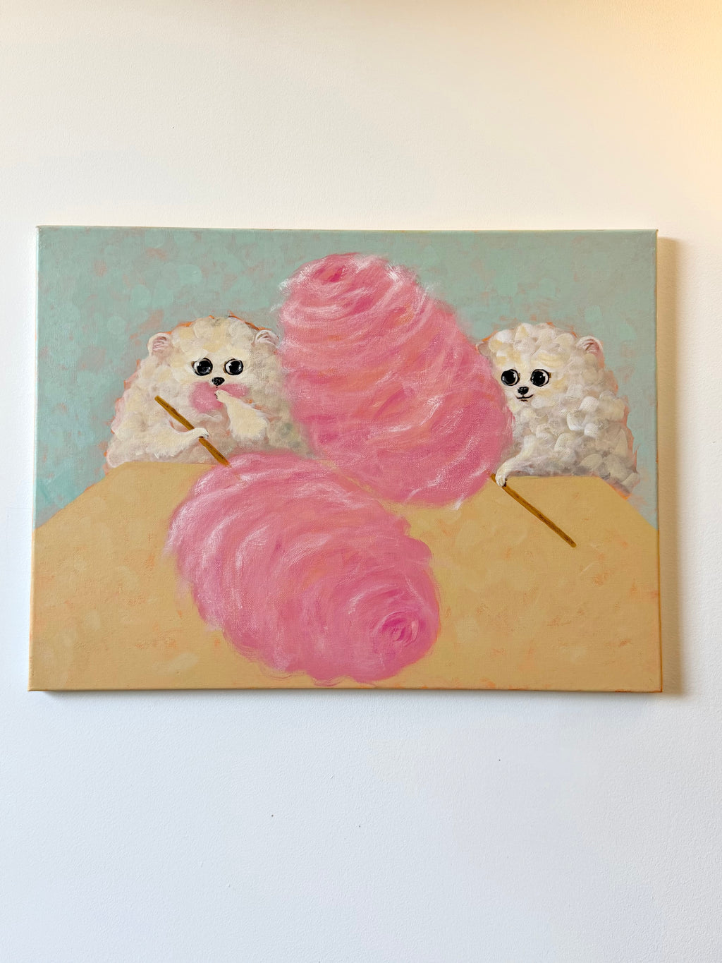 Clouds of Sugar whimsical dog artwork displayed on a clean wall with soft pink cotton candy details