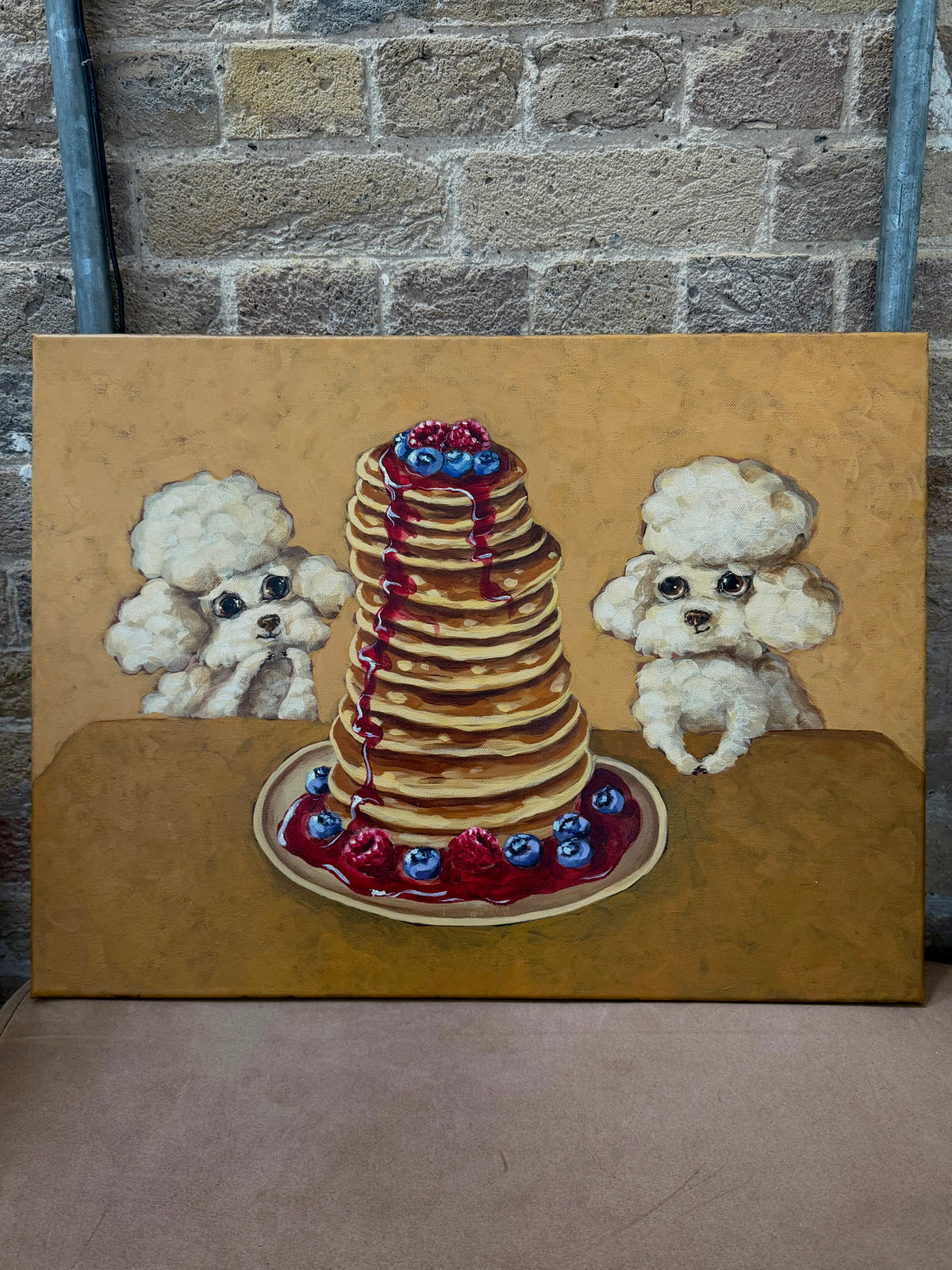 Pancake Day original acrylic painting featuring two fluffy dogs beside a colourful stack of pancakes by Mariana Bivol
