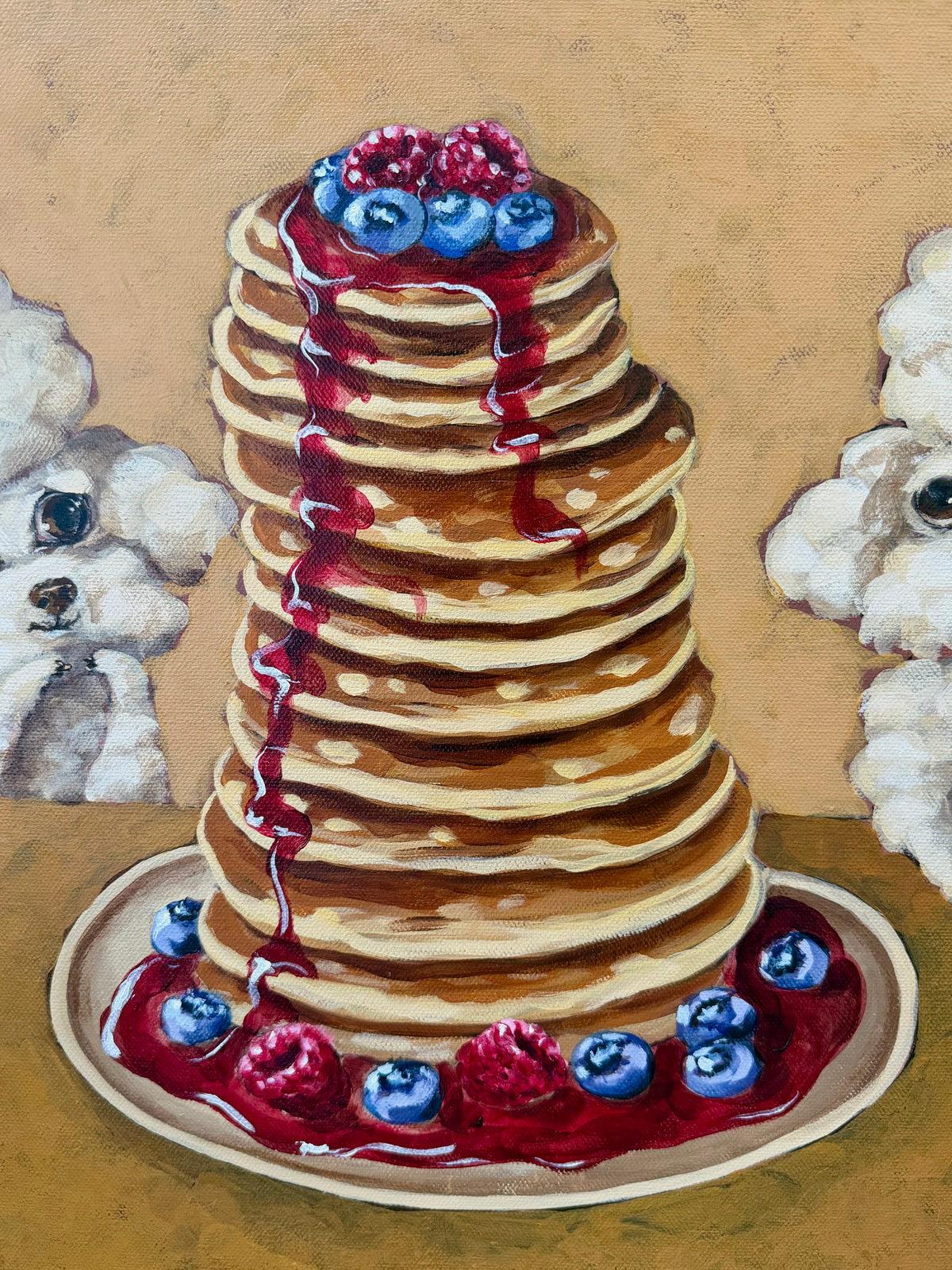 Close-up of Pancake Day acrylic painting showing two fluffy dogs and a colourful pancake stack