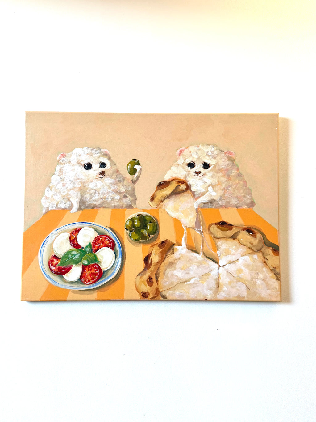 Paws & Mozzarella dog and Caprese acrylic painting displayed on a clean white wall